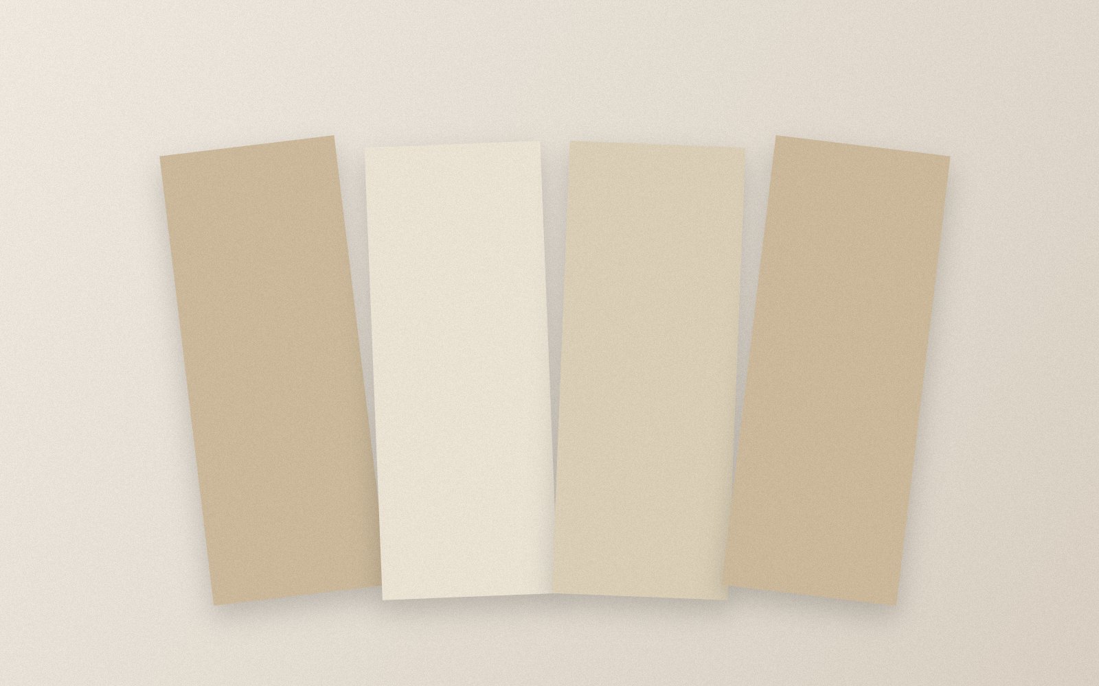 Four rectangular pieces of card in different shades of brown and white.